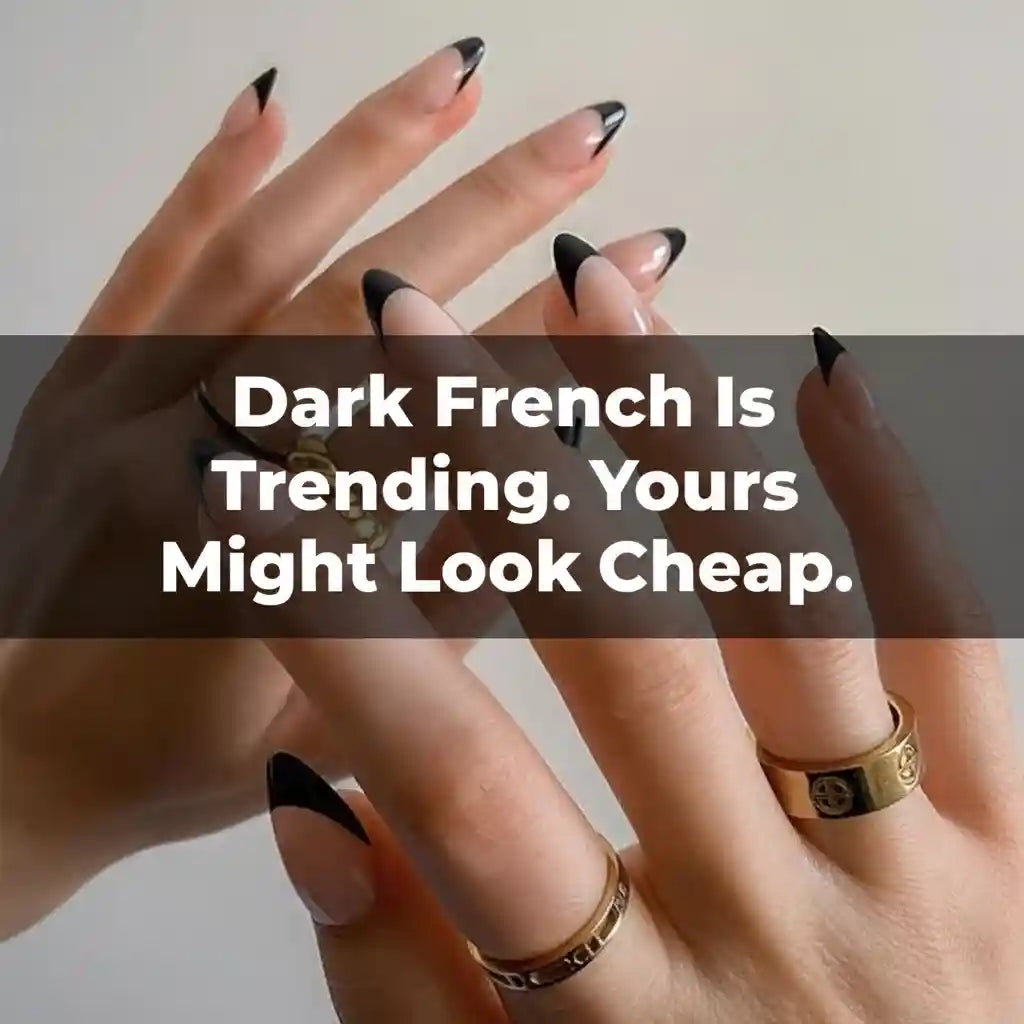 Hands with black French tip almond press-on nails and gold rings — "Dark French Is Trending. Yours Might Look Cheap." by MOONLEE