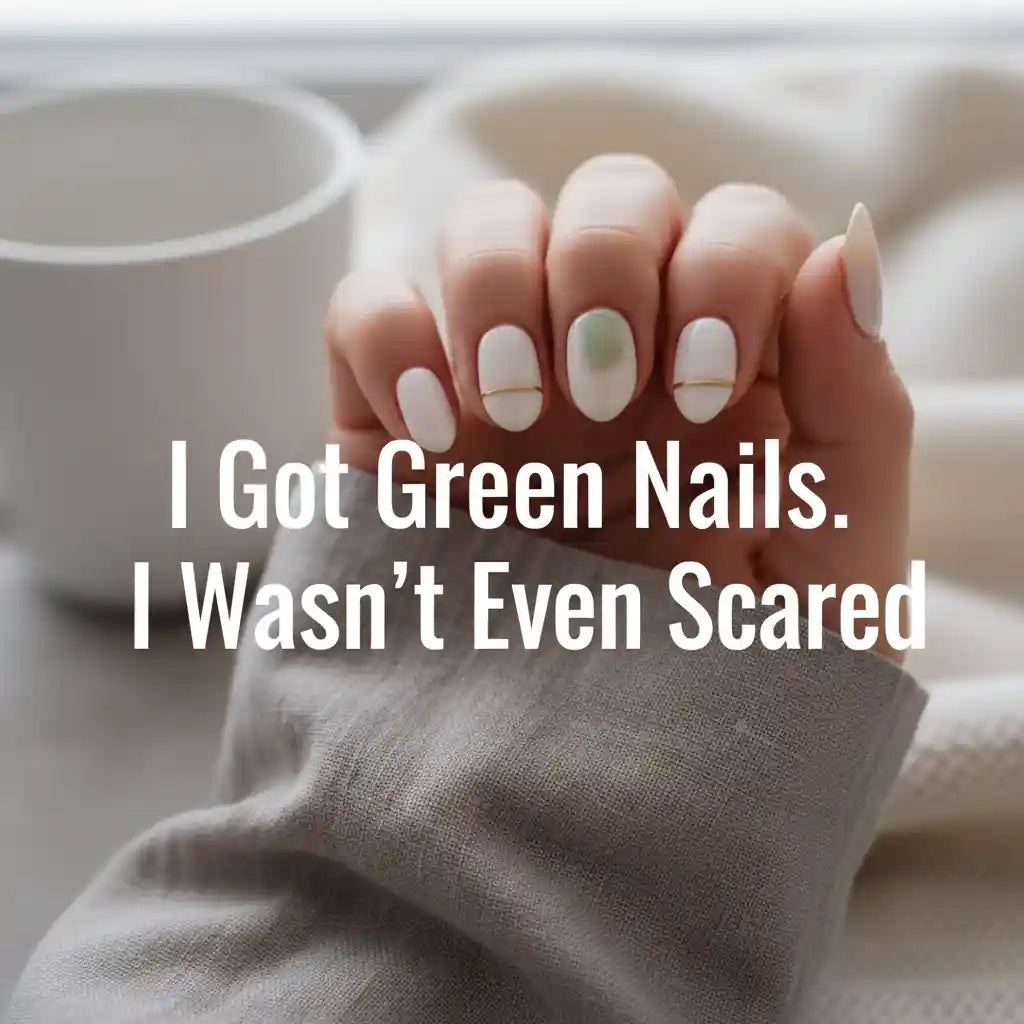 A hand with short press-on nails, one nail showing a subtle green tint — "I Got Green Nails. I Wasn't Even Scared." by MOONLEE