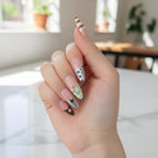 Fun Patch Press-On Nails — on-hand lifestyle shot showing full set of candy-colored almond nails with rhinestone and star charm details | MOONLEE